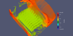 red and green computed tomography image of a cylinder with scale bar and gray background