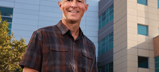 Rob standing in front of the HPC building