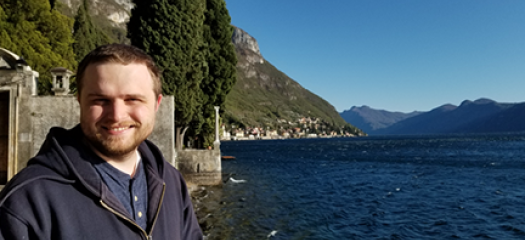 Trevor standing on a scenic coastline