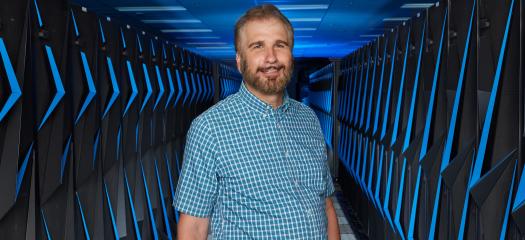 Marty Marinak in front of Sierra supercomputer