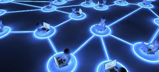 many individual cartoon users at computers connected by bright blue lines signifying a collaborative network