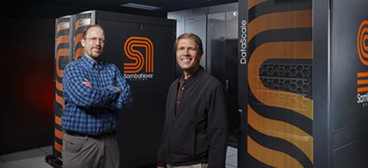 Brian Van Essen and Bronis de Supinski in front of SambaNova systems
