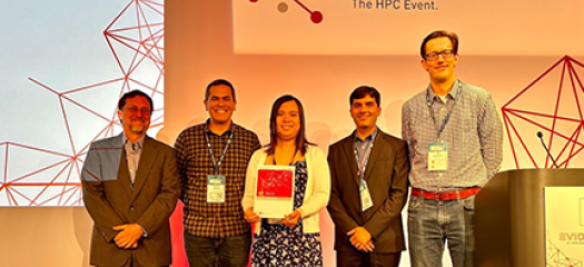 Ignacio Laguna and colleagues standing with the ISC 2023 Hans Meuer Award certificate.