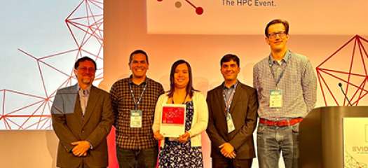 Ignacio Laguna and colleagues standing with the ISC 2023 Hans Meuer Award certificate. 