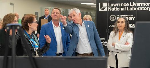 DOE secretary and LLNL officials in the machine room