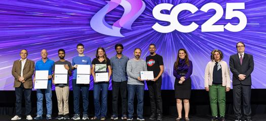 research team on stage accepting the award
