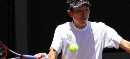 LLNL computer scientist Greg Lee is shown playing tennis