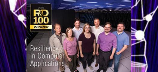 SCR team in front of Sierra with R&D 100 logo