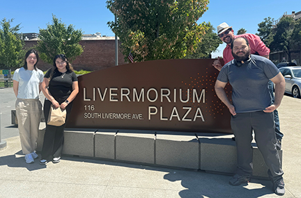 group of students and Otto Venezuela on Livermorium Plaza