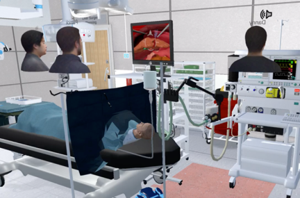 A VR patient is undergoing surgery surrounded by medical equipment. Two avatars are looking at a laparoscopic view of the surgery while a third is monitoring graphs of the patient’s vitals.