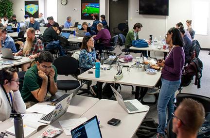 wide-angle view of the hackathon room