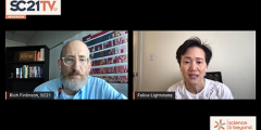 screen shot of Felice and interviewer on video chat with SC21 logo at bottom right