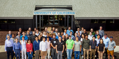 meeting attendees posed as a group outside UCLCC