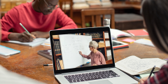 stock photo of people studying and learning at a laptop