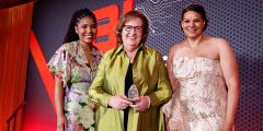 Olivia Igbokwe-Curry, Patricia Falcone and Sara Sidner pose for a photo following Falcone’s receipt of the inaugural AI Honors in Public Science Award