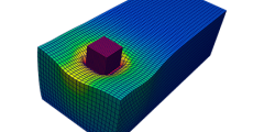 3D two-block problem: maroon cube resting on a large blue rectangle, causing a deformity with magnitude denoted by varying colors; both shapes are resolved by meshes