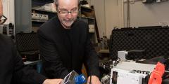 Greg White and Steven Kreek inspect the Radiation Field Training Simulator