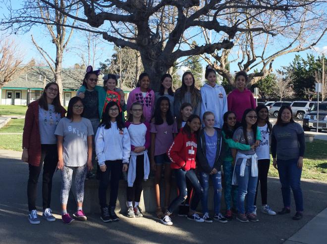 Marisa Torres with students at the Girls Who Code graduation